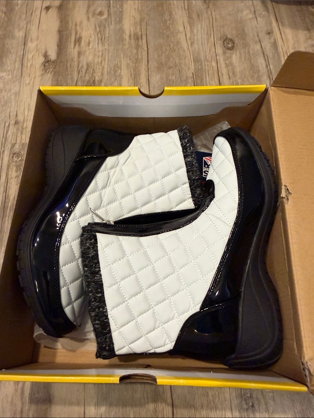 Khombu White Quilted Slip-On Sneakers with Black Trim
